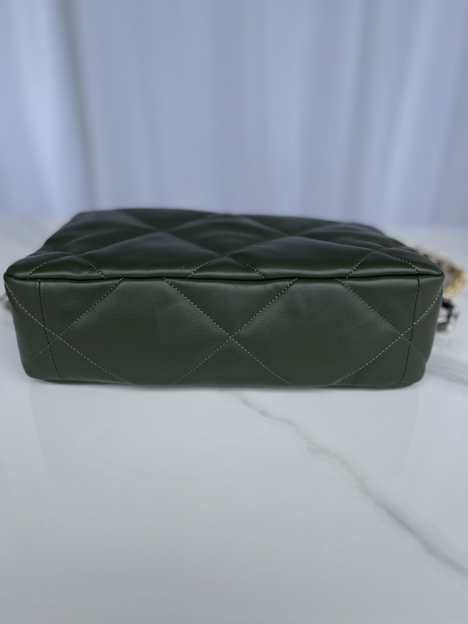 Ch*el 19 large handbag shiny leather, gold-tone, silver-tone & ruthenium-finish metal dark green 7.8 × 11.7 × 3.9 in