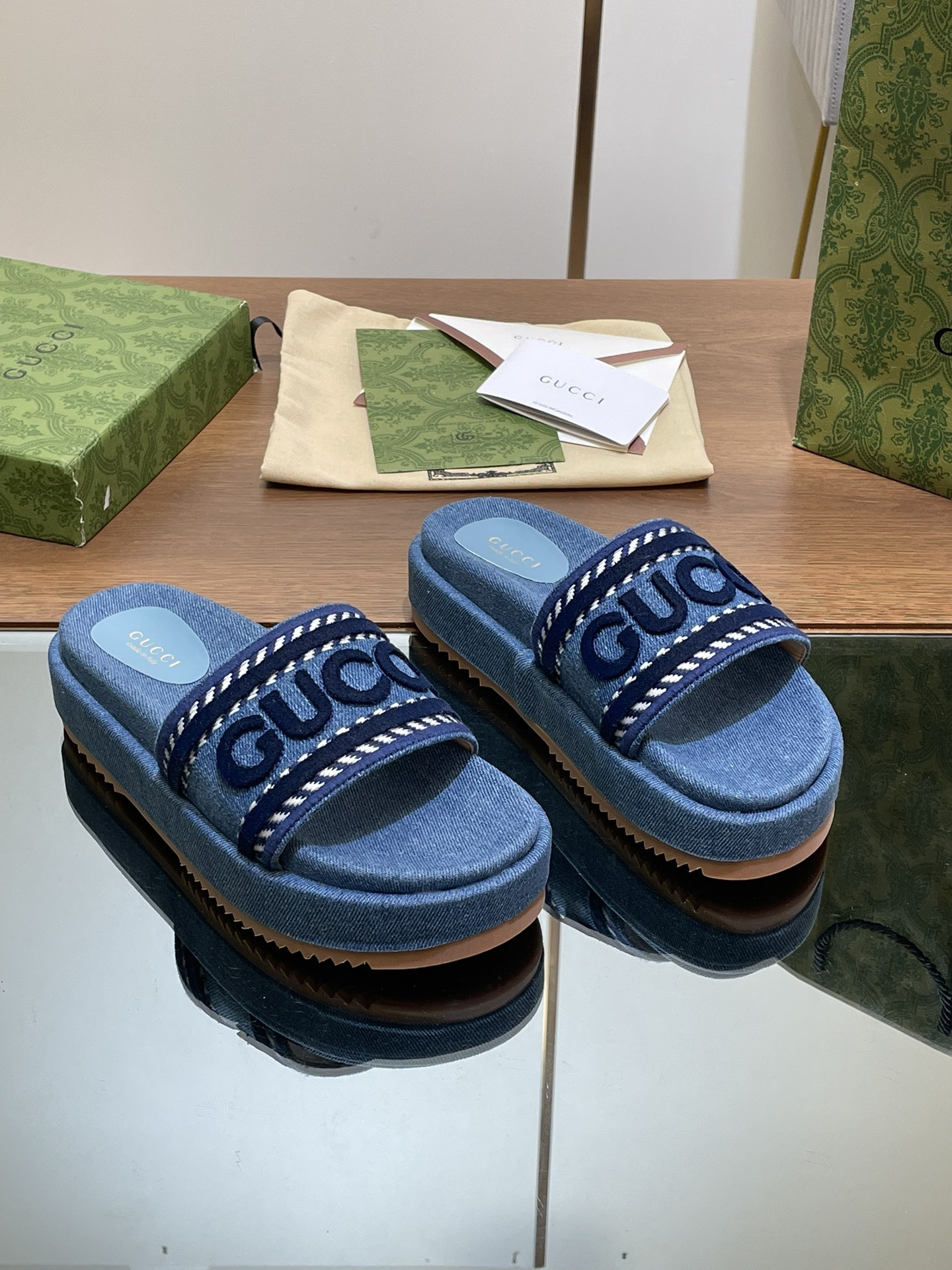 ua G*u*i slide sandal with G*u*i script