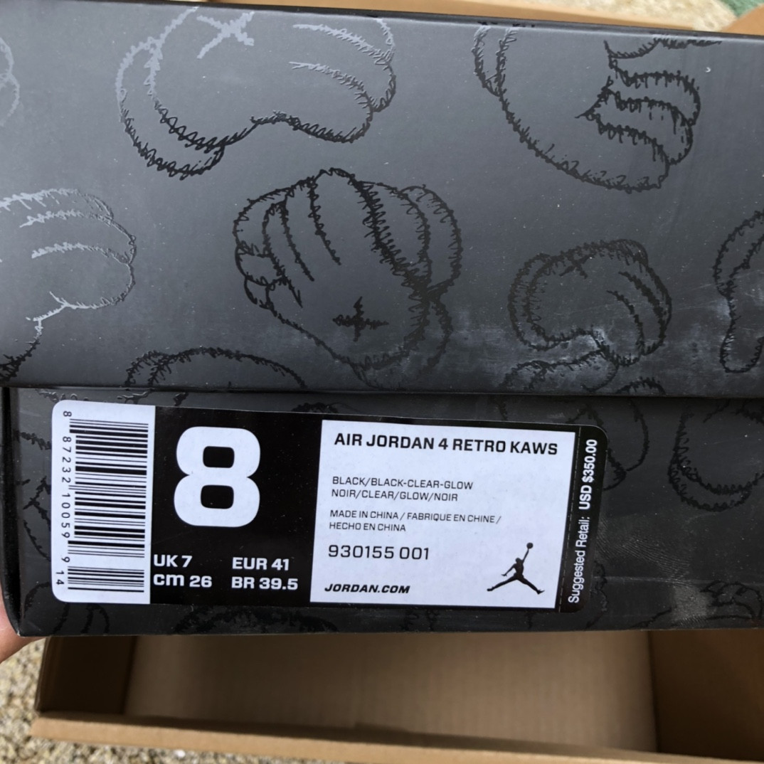 UA Jordan 4 Retro Kaws Black