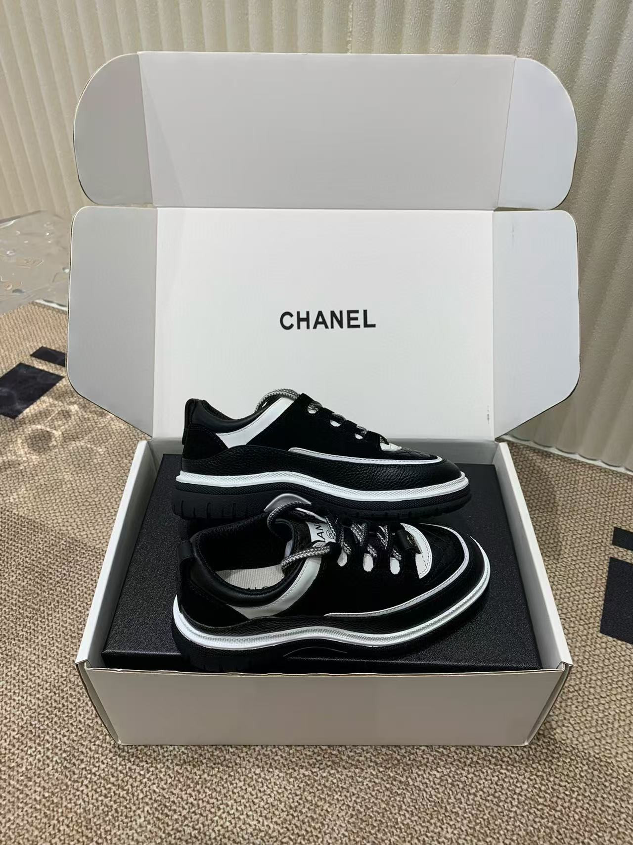 UA Ch**el Sneaker