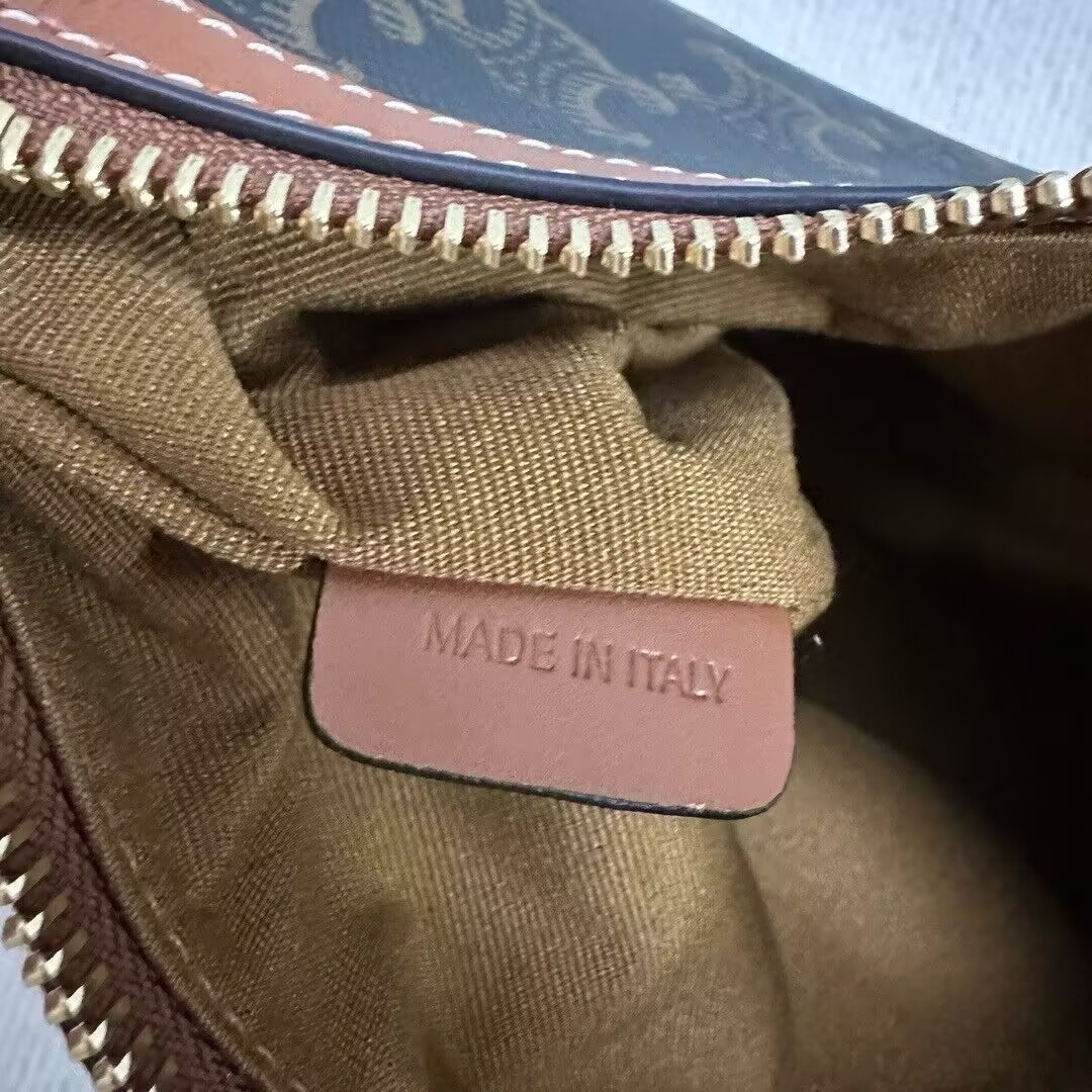 Ce1i*e SMALL HELOÏSE BAG IN TRIOMPHE CANVAS AND CALFSKIN 19x22x5cm