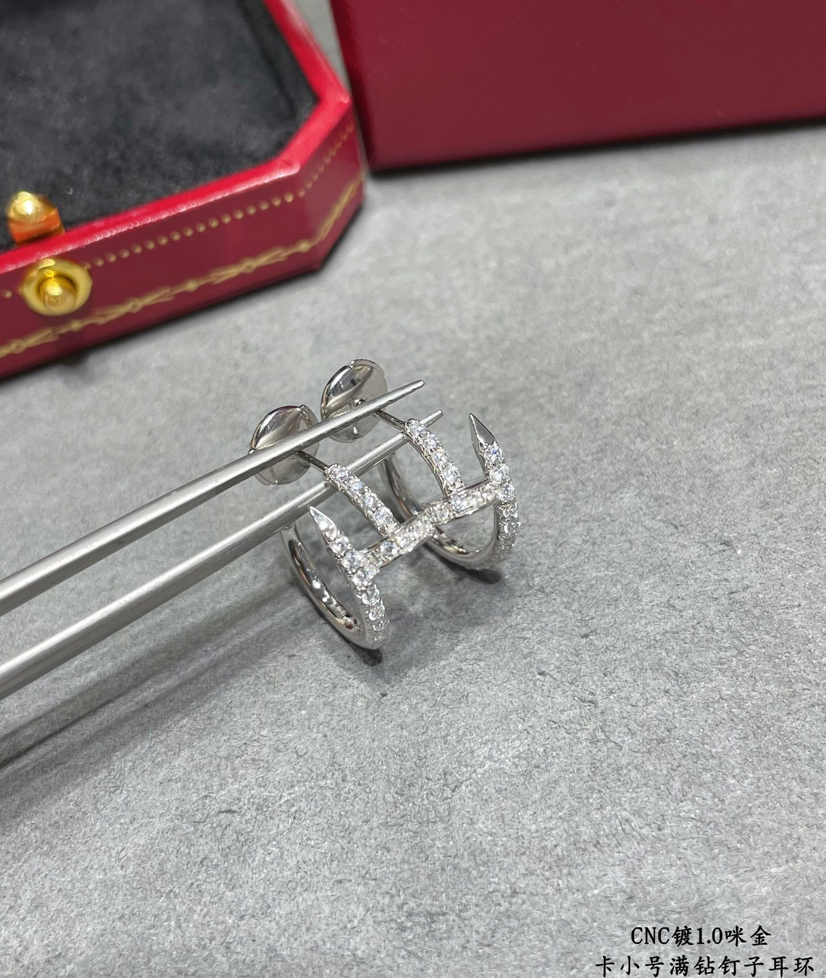 Ca*t1er Fully D1am0nd-encrusted small nail Earrings