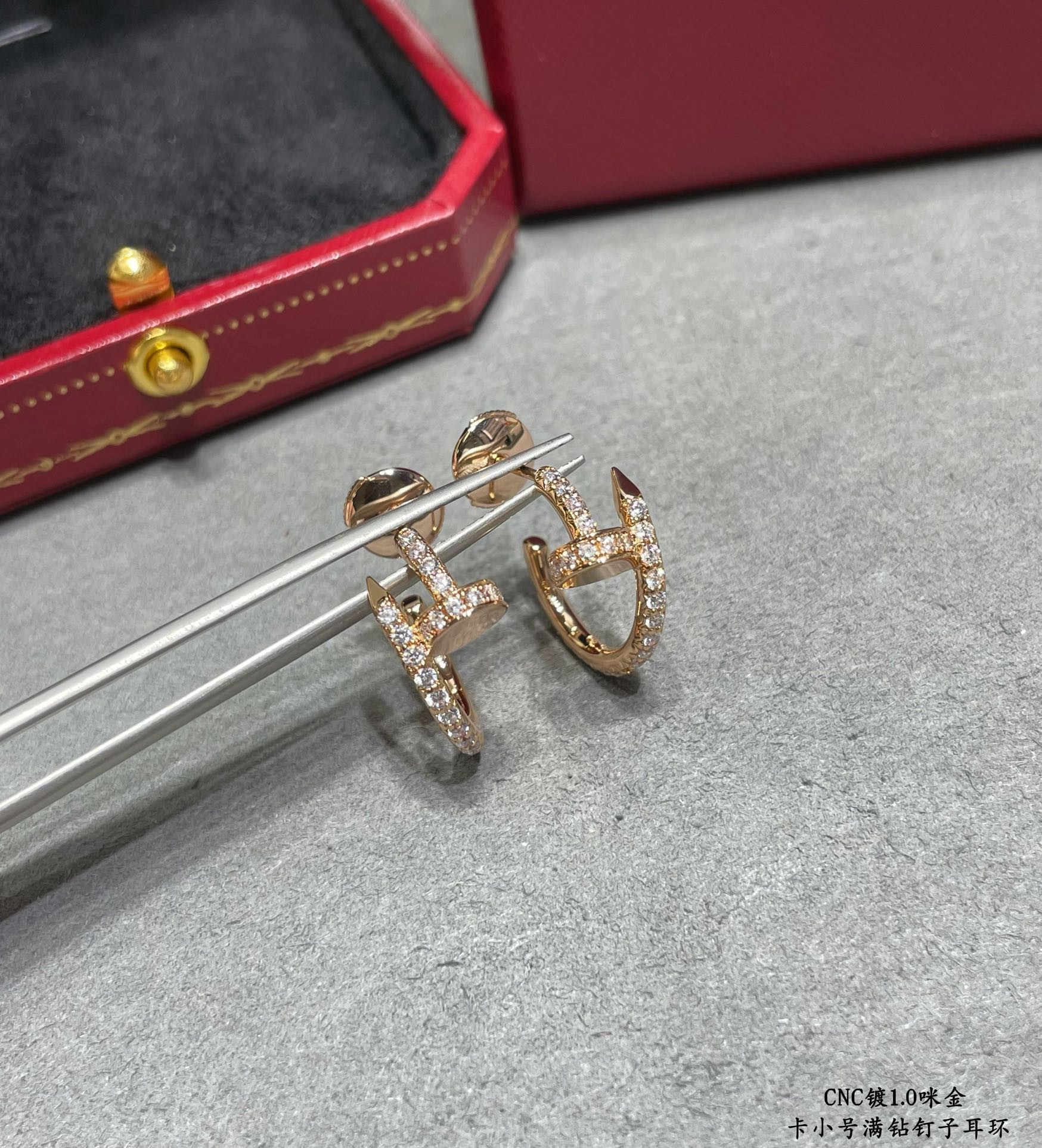 Ca*t1er Fully D1am0nd-encrusted small nail Earrings