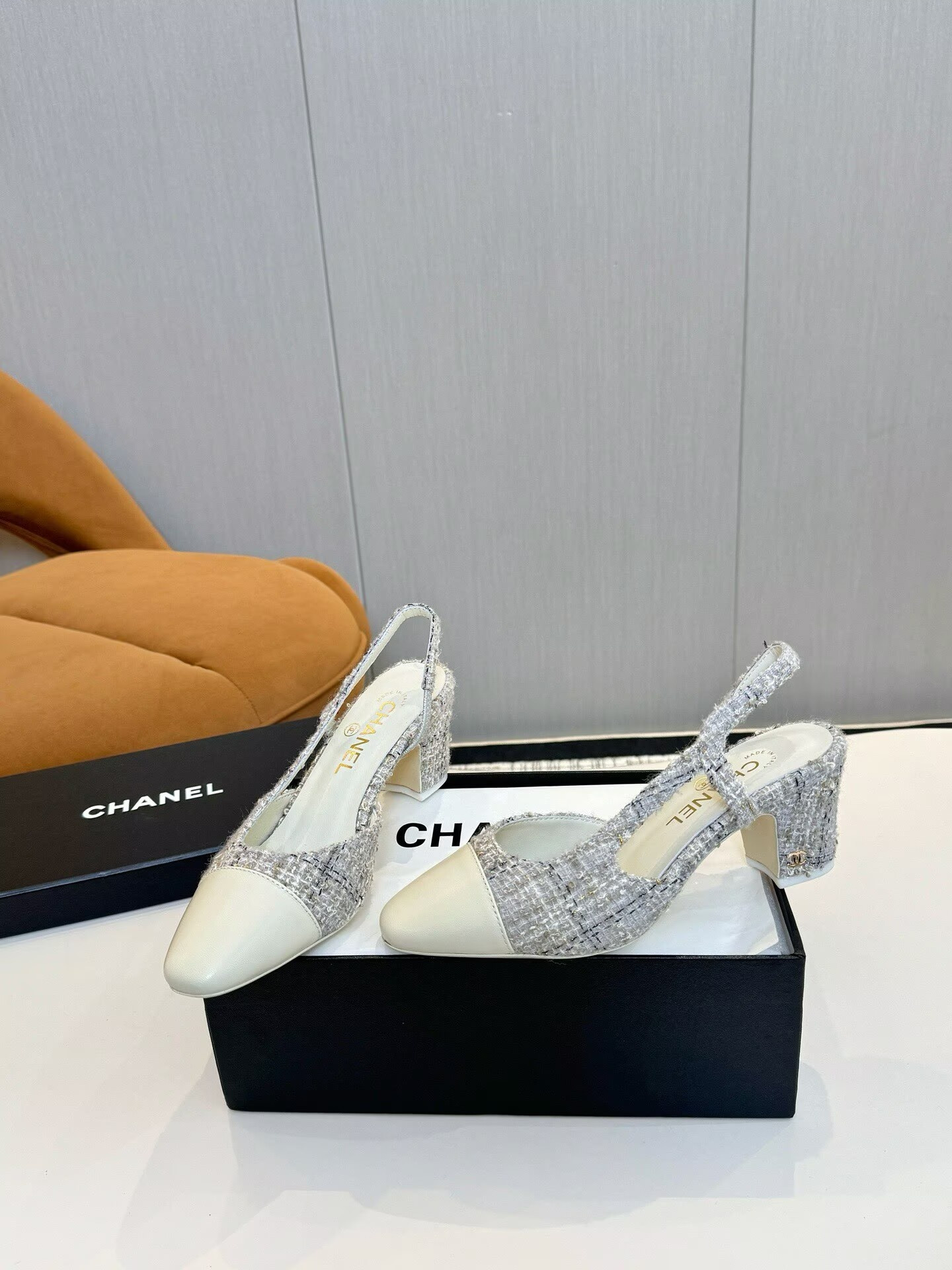UA Ch**el Slingpumps