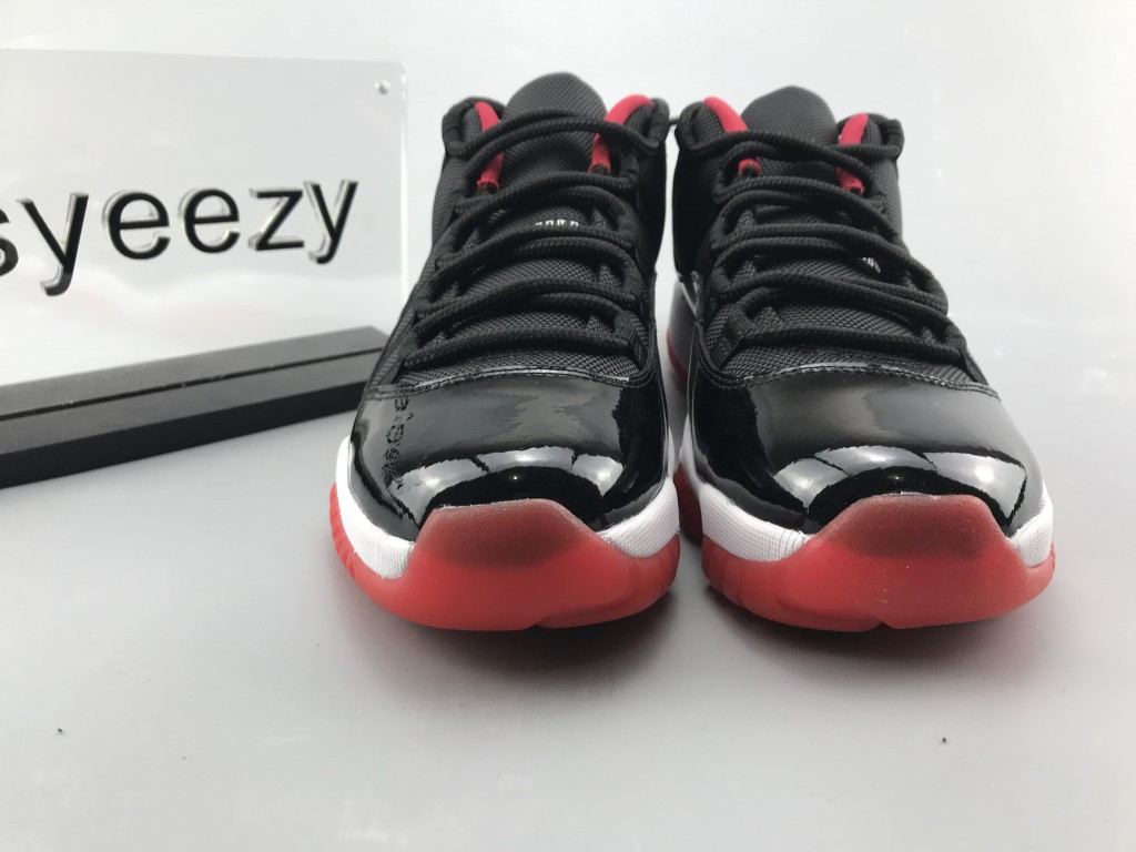 UA AIR JORDAN 11 RETRO LOW BRED