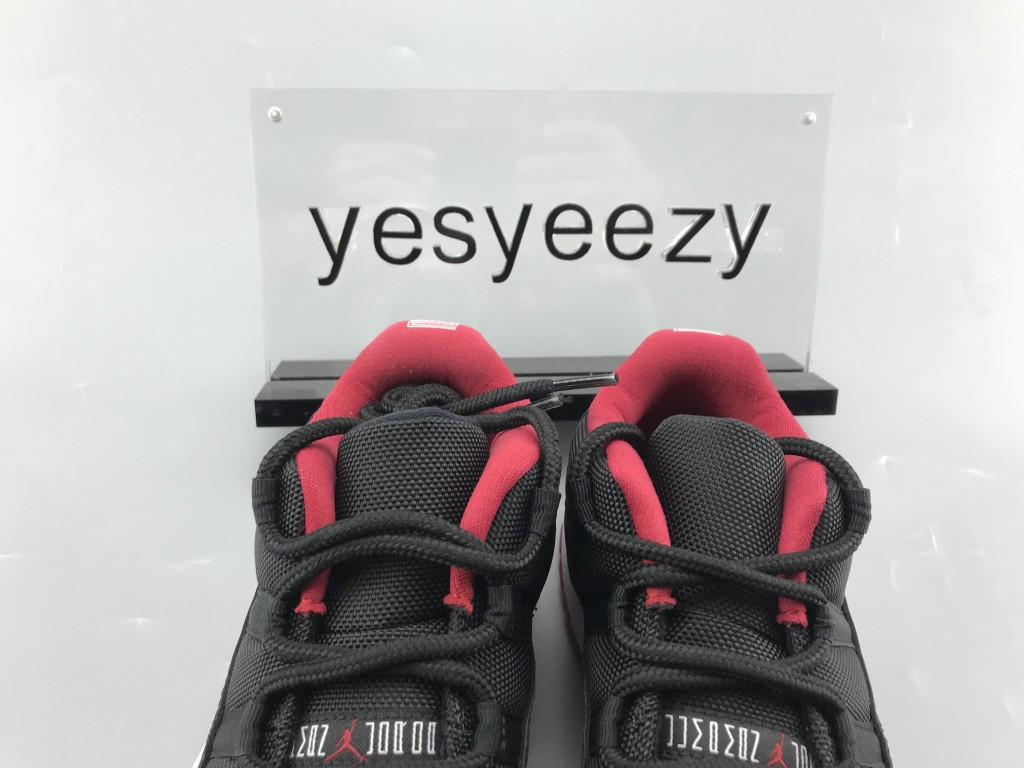 UA AIR JORDAN 11 RETRO LOW BRED