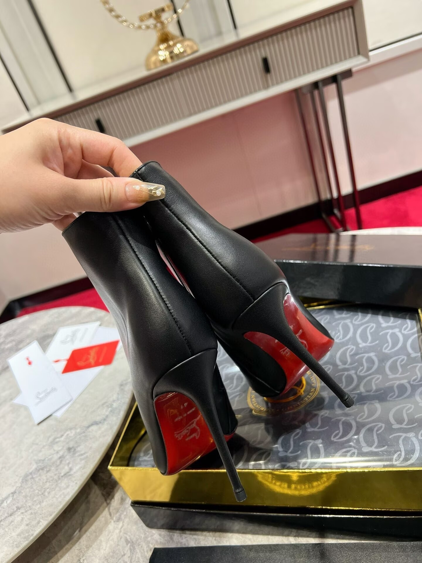 UA Chr1st1an Louboutin Miss Z Booty 100 mm Low Boots Calf leather Black