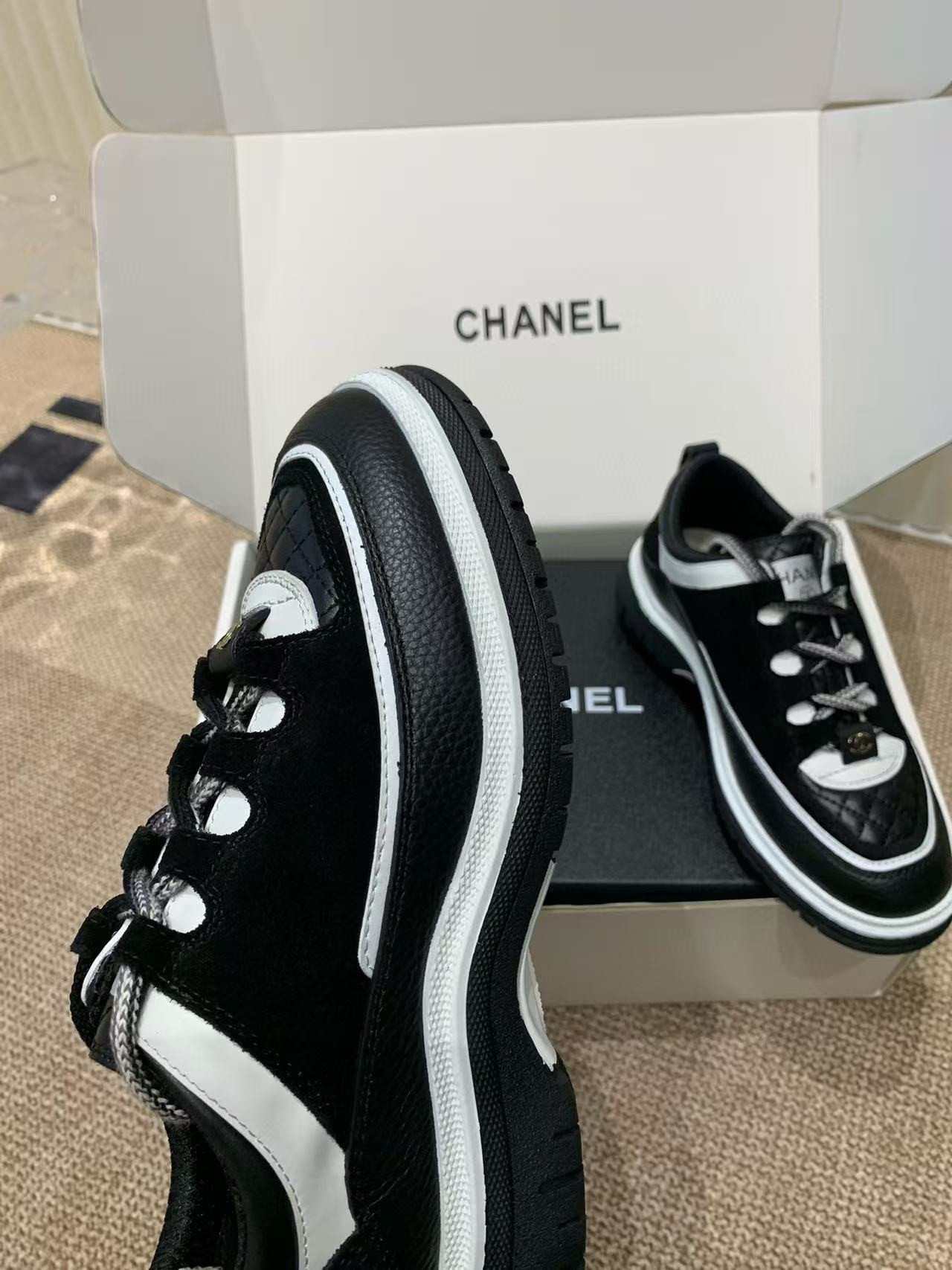 UA Ch**el Sneaker