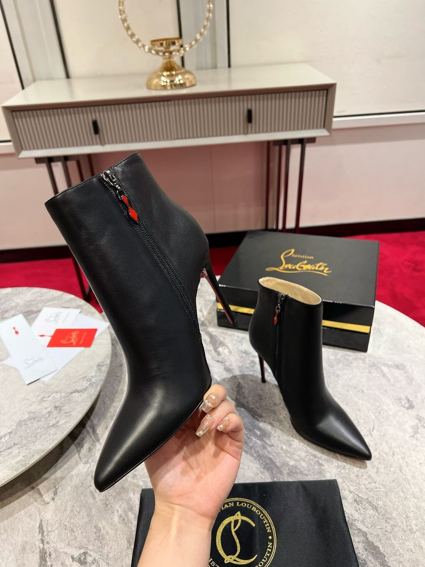UA Chr1st1an Louboutin Miss Z Booty 100 mm Low Boots Calf leather Black