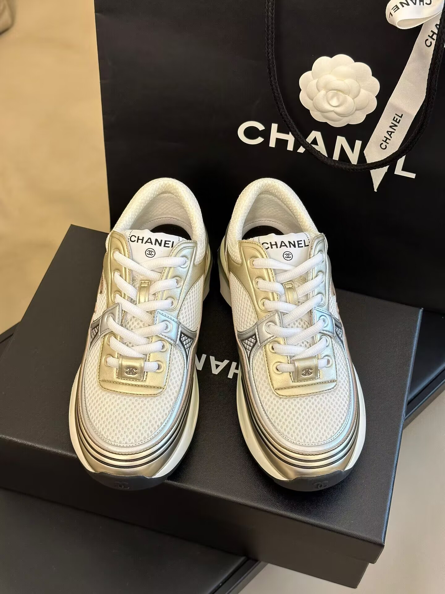 Ch**el CC Runner Gold Laminate