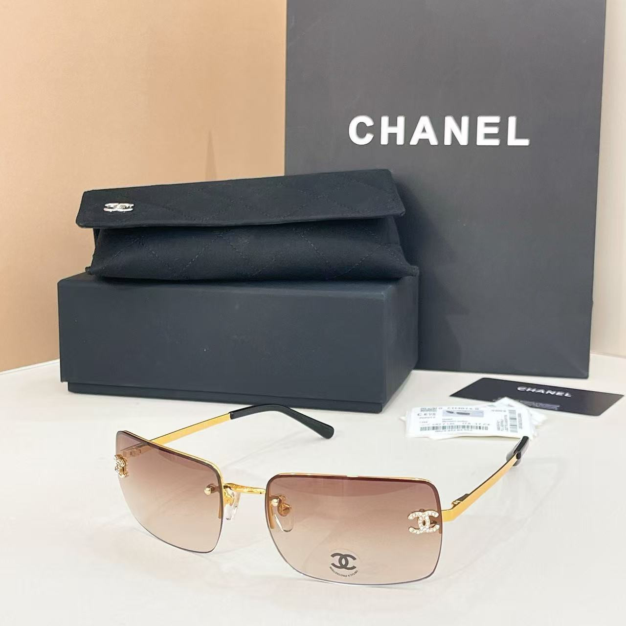 Ch**el crystal logo glasses