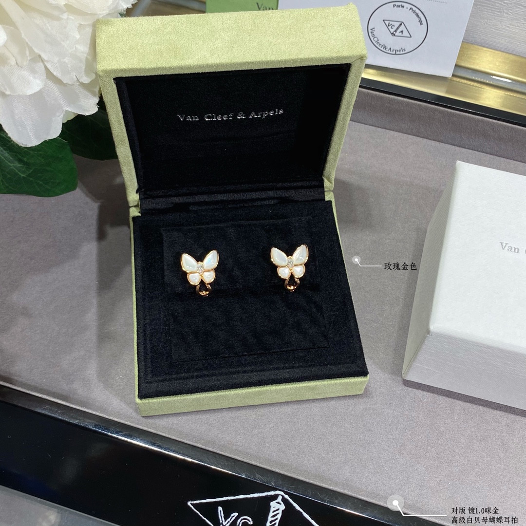 V*n Cl**f & Arpels White Mother-of-Pearl Butterfly Earrings
