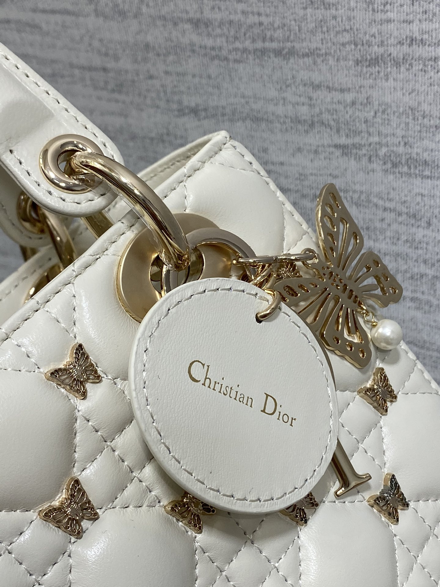 SMALL LADY D10r White with Butterfly Studs