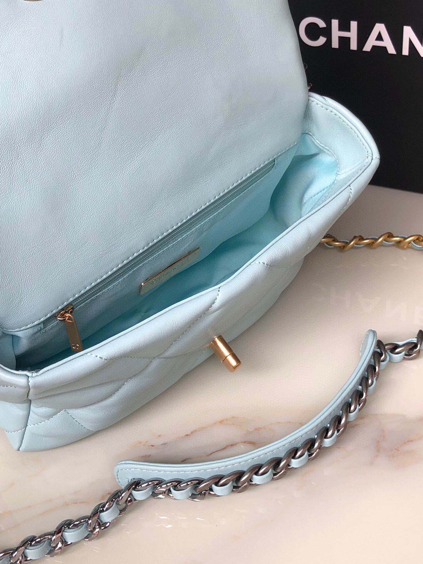 Ch**el 19 HANDBAG Shiny Leather, Gold-Tone, Silver-Tone & Ruthenium-Finish Metal Light Blue 6.2 × 10.1 × 3.5 in