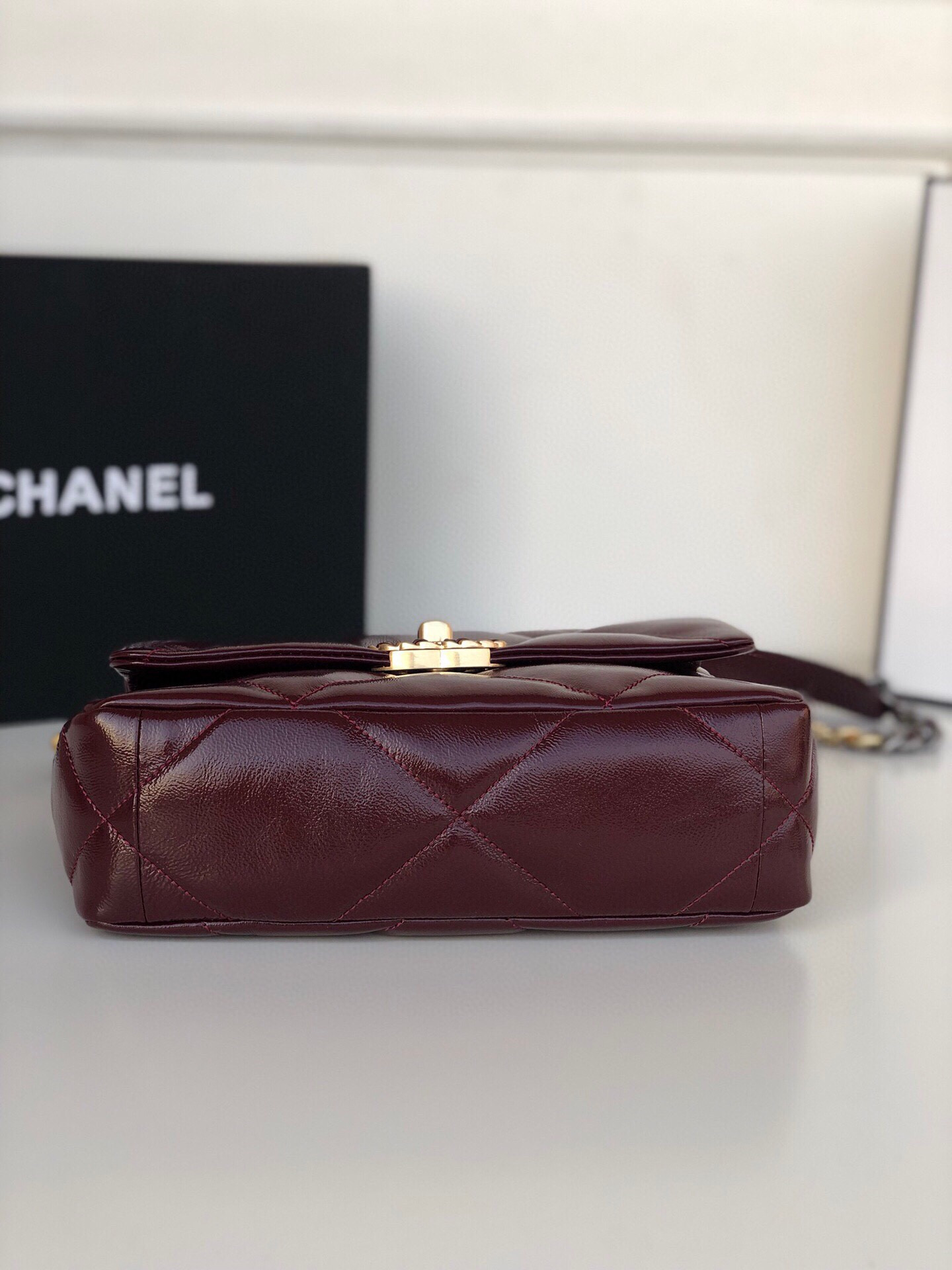 Ch**el 19 HANDBAG Shiny Leather, Gold-Tone, Silver-Tone & Ruthenium-Finish Metal Dark Red 6.2 × 10.1 × 3.5 in