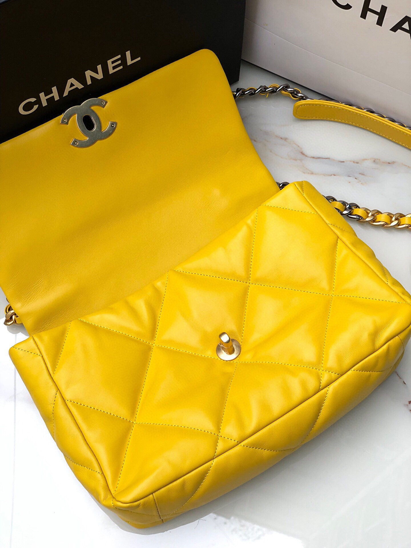 Ch**el 19 LARGE HANDBAG Shiny Leather, Gold-Tone, Silver-Tone & Ruthenium-Finish Metal Yellow 7.8 × 11.7 × 3.9 in