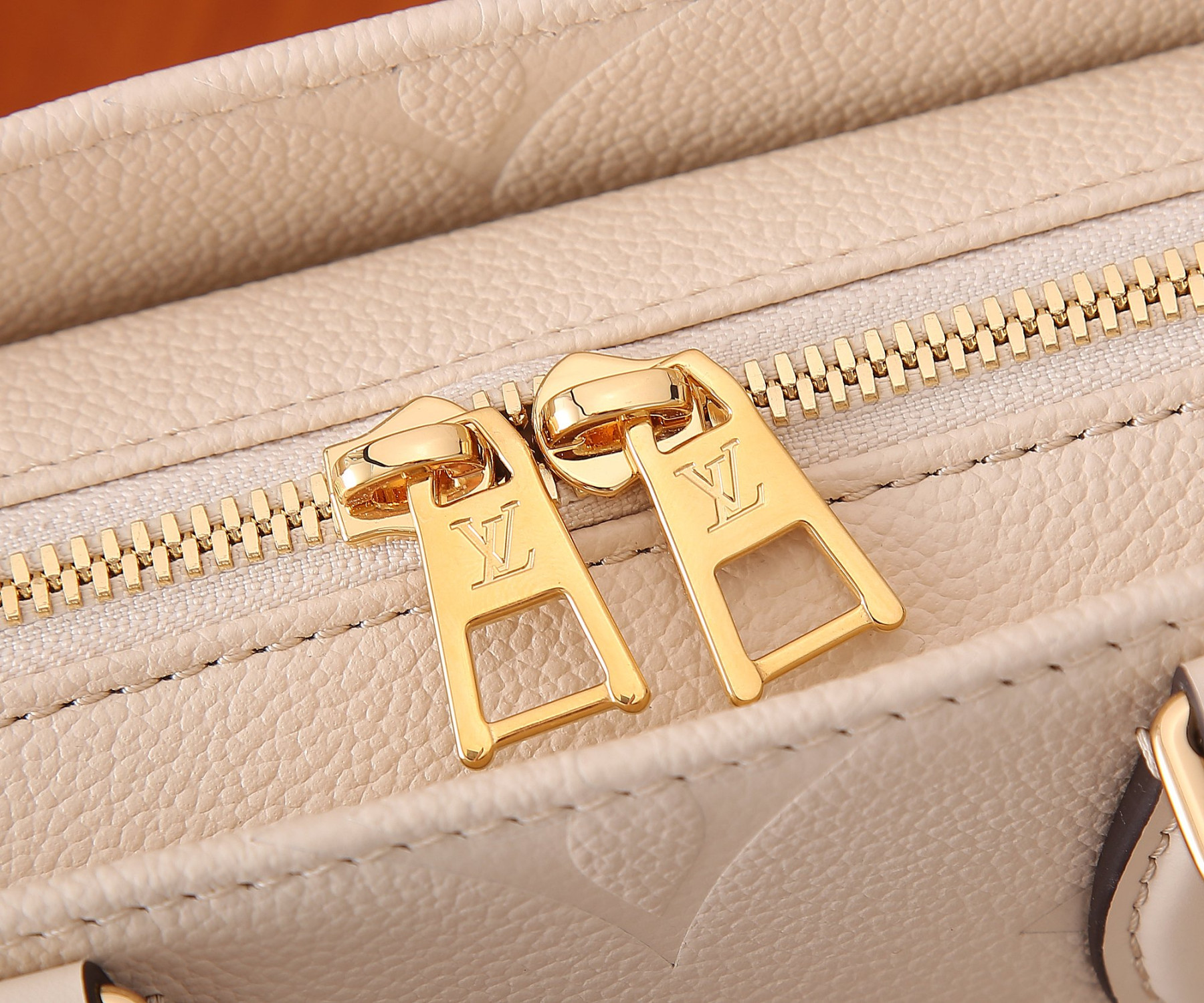 LV OnTheGo East West M23698 9.8 x 5.1 x 3.9 inches