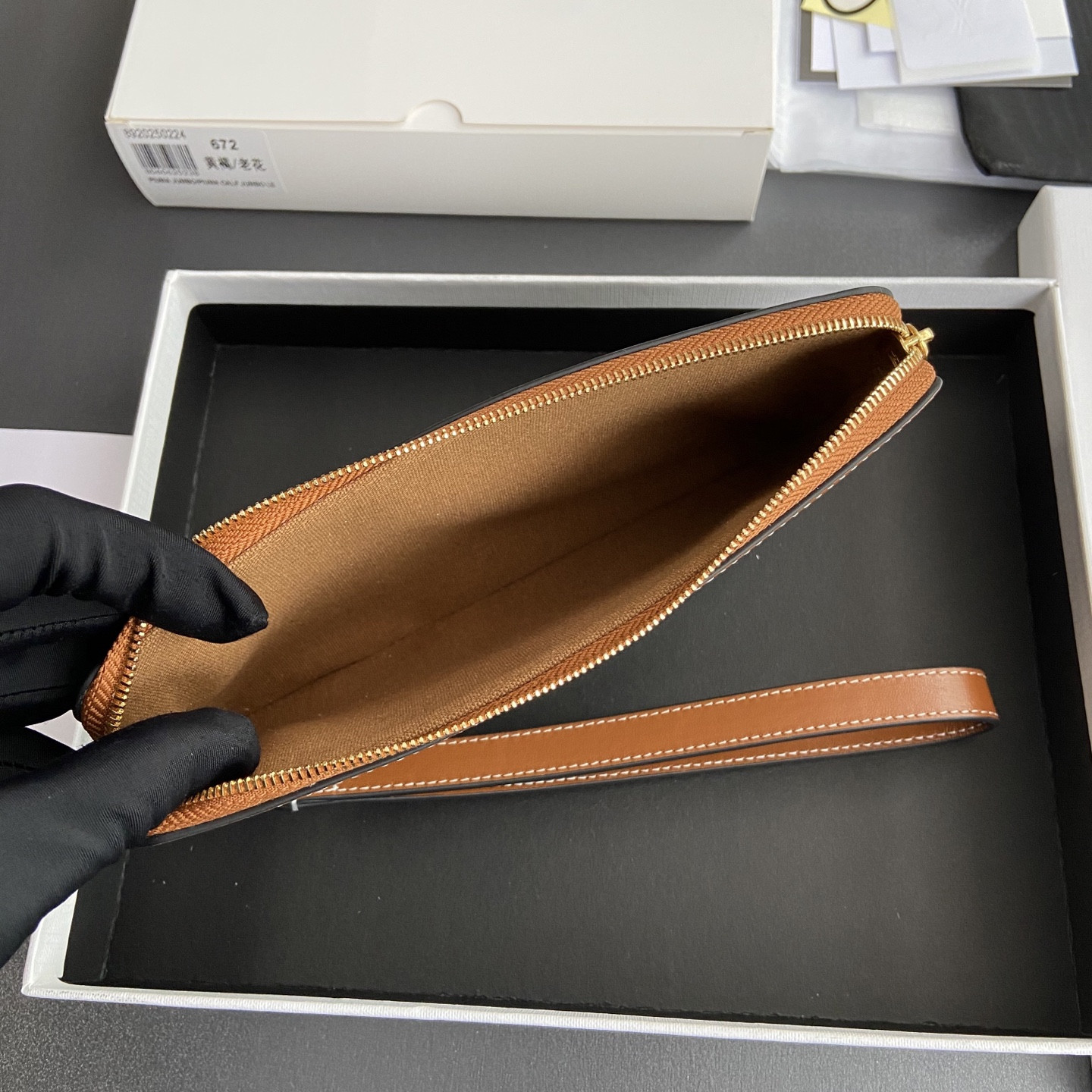 Ce1i*e LONG POUCH WITH STRAP in triomphe canvas and calfskin 21.5x11.5x1cm