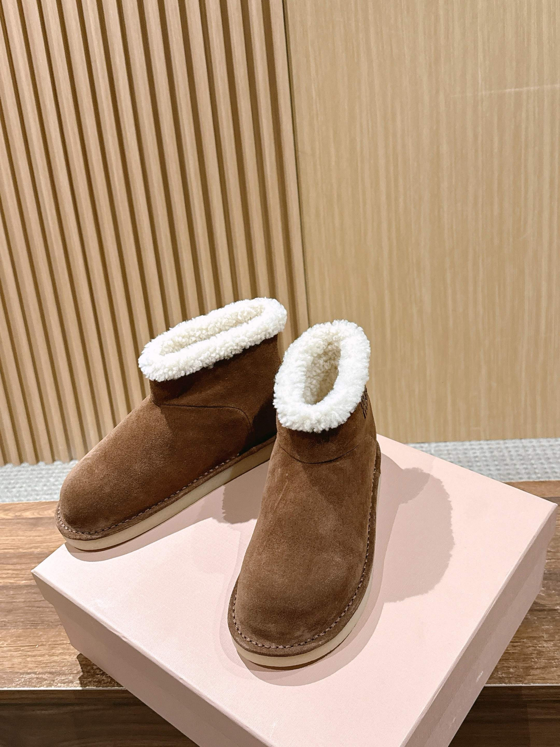 UA Miu Miu Suede and Shearling Booties