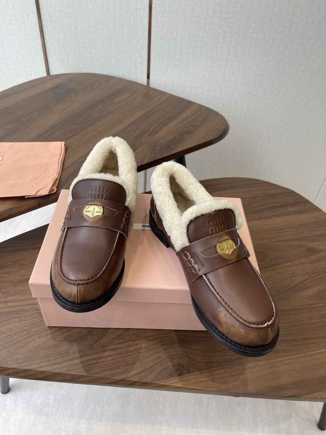 UA Miu Miu Bleached Leather and Shearling Penny Loafers
