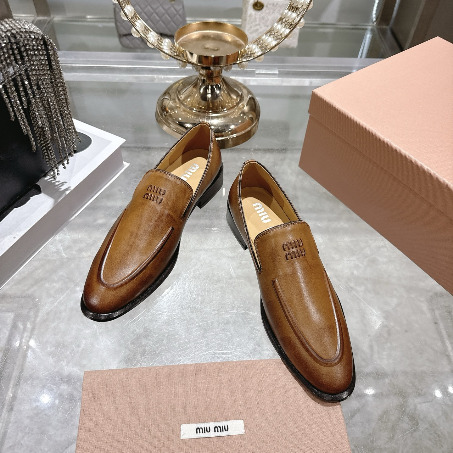 UA Miu Miu Leather Loafers
